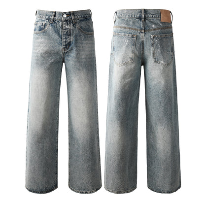 Edgy Men’s Light Wash Loose Fit Jeans with Washed Fade Effect and Light White Paint Splatter Design 101