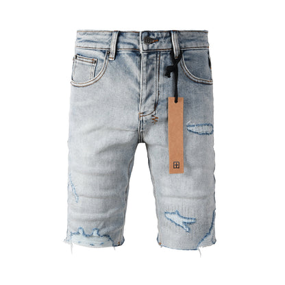Men's Vintage Light Wash Ripped Denim Shorts with Raw Cut Hem and Distressed Details 2003