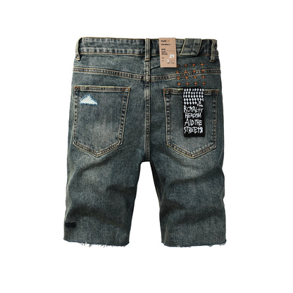 Men Streetwear Denim Shorts Dark Washed Blue with Distressed Details Raw Hem and Graphic Patch 2004