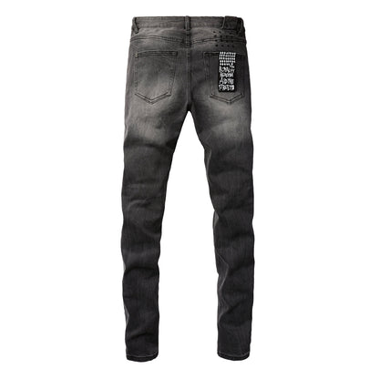 Urban Gray Ripped Jeans with Bold Black Graffiti Accents 3003