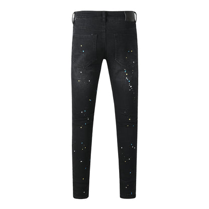 Streetwear Men’s Black Ripped Slim Jeans with Multi Color Paint Splatter Effect and Rugged Tear Details 9121