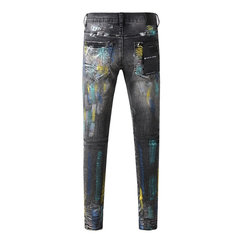 Fashionable Black Jeans with Bold Colorful Paint and Graffiti Detailing 9078