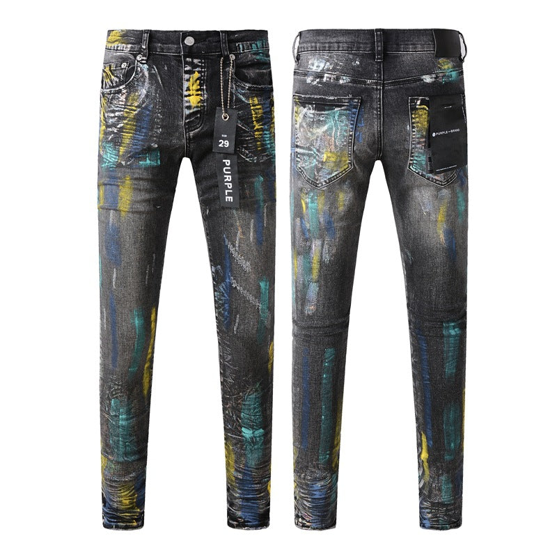 Fashionable Black Jeans with Bold Colorful Paint and Graffiti Detailing 9078
